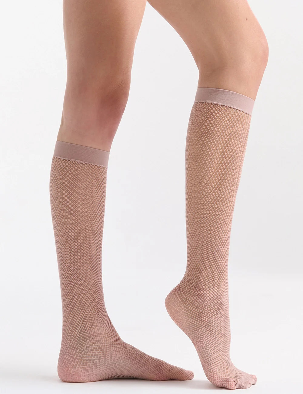 Beige fishnet knee high socks with smooth elastic band made of breathable fishnet material for stylish wear