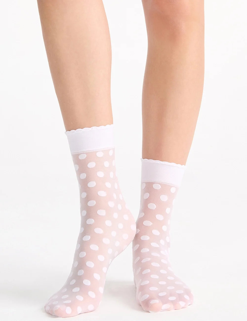 Pink sheer ankle socks with white polka dots and scalloped white cuff from polka dot anklets collection