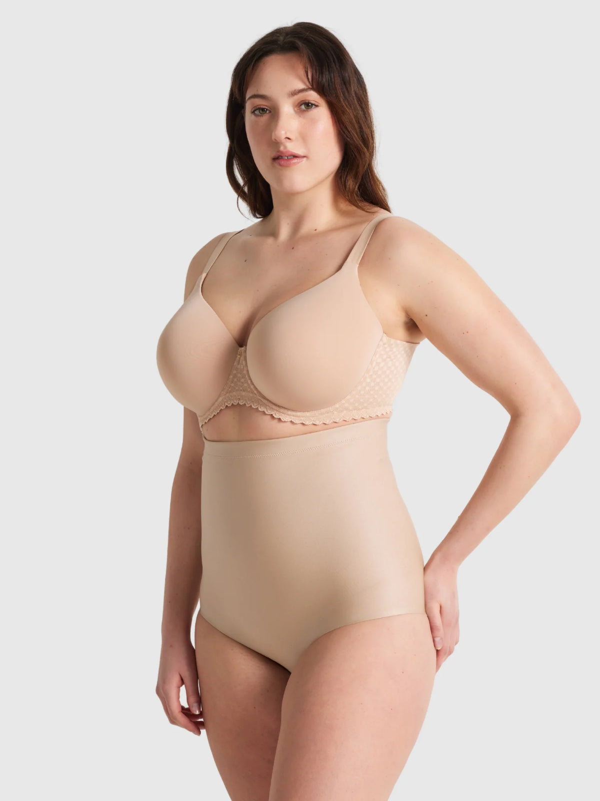 Beige plus-size shapewear bodysuit x-factor high waisted brief with delicate lace trim along the neckline