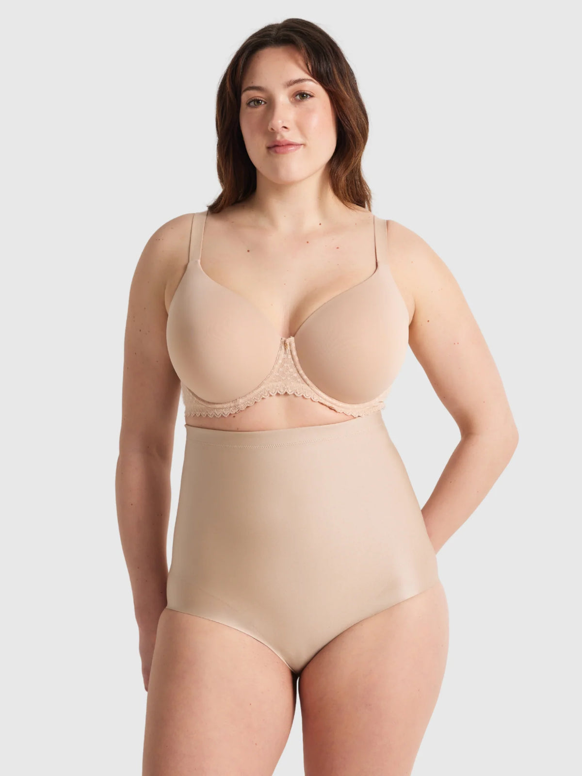 Beige high waisted shapewear brief set with lace trim on bra cup designed for body shaping and support
