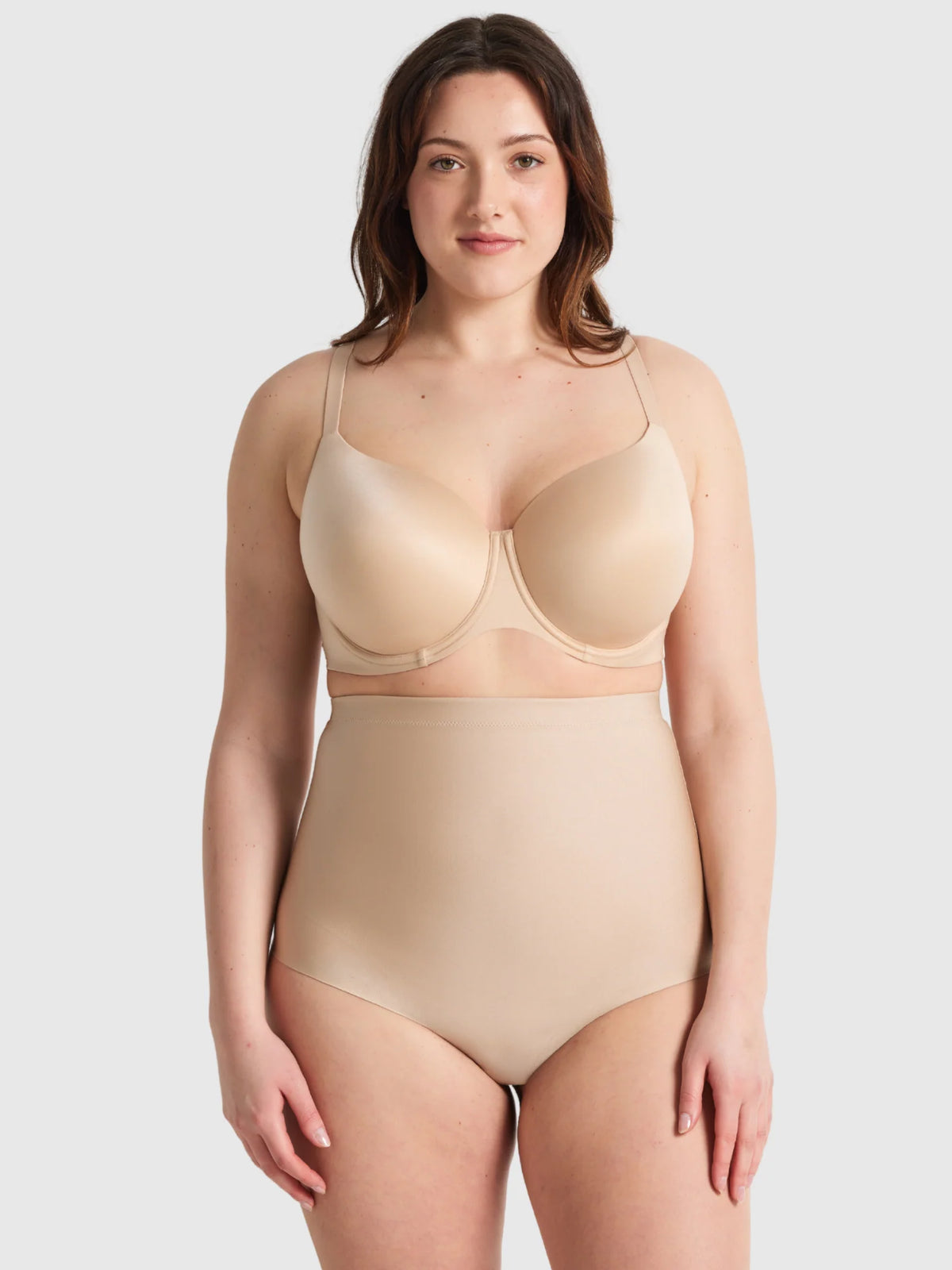 Beige high waisted thong shapewear set with seamless form fitting design for smooth body contouring