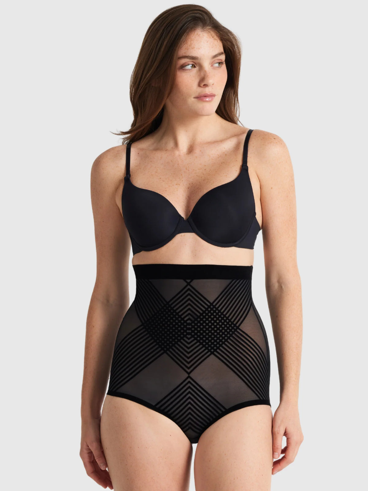 Black sheer high waist brief shapewear with geometric patterned mesh panels for smooth contouring