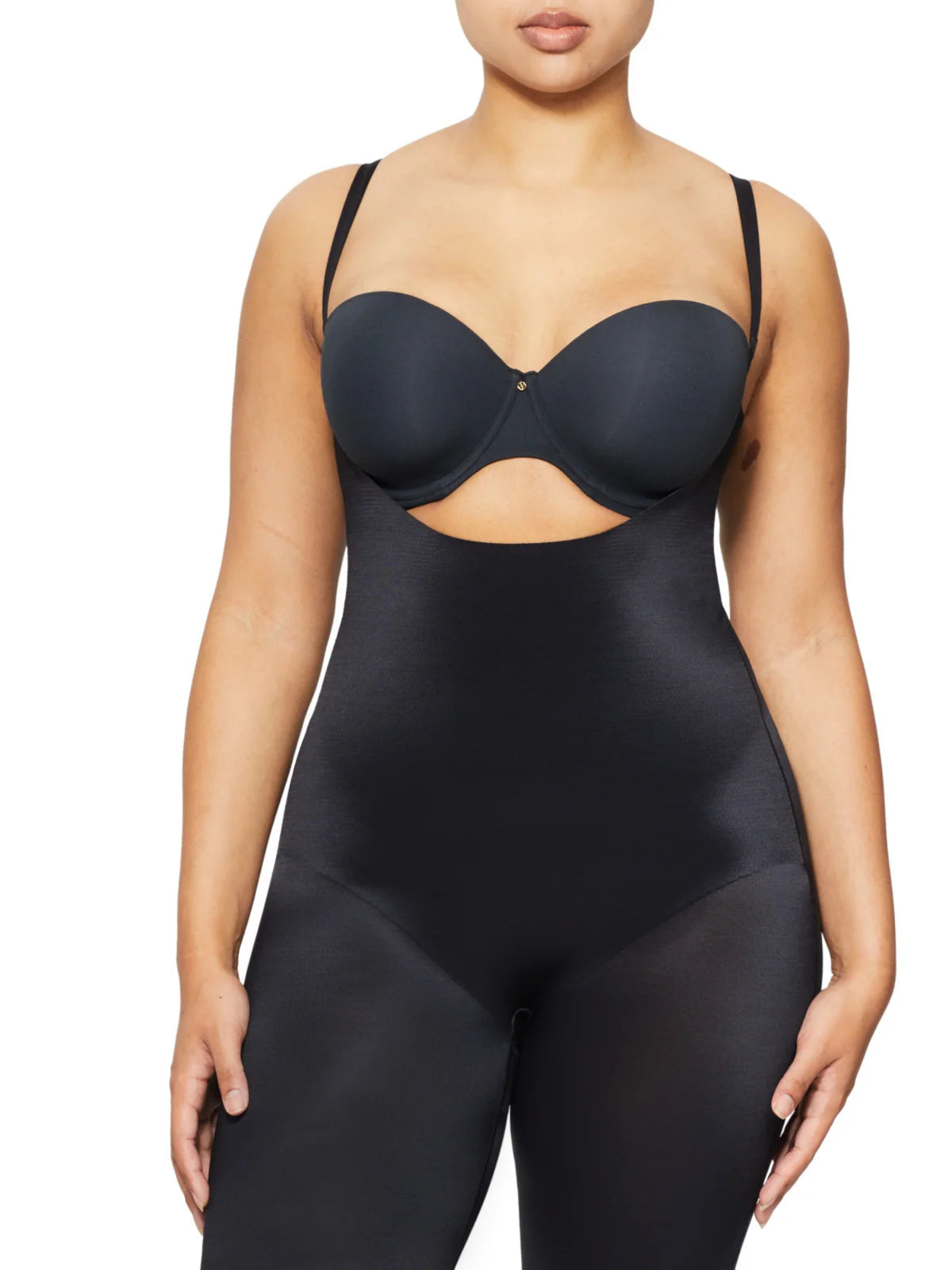 Black seamless shapewear underbust jumpsuit by body skiins with thin straps and bust cutout for smooth contouring