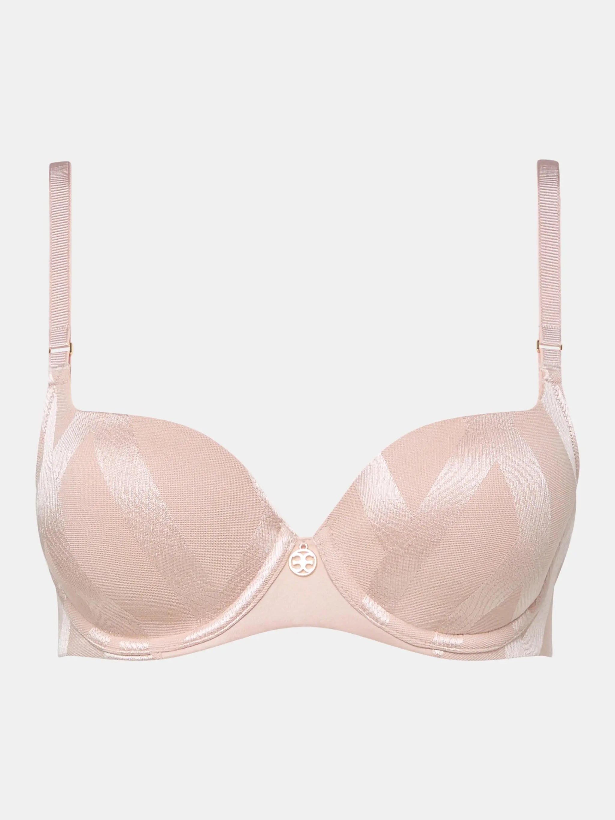 A delicate blush pink glaze very covering bra with subtle shimmering texture and thin matching straps