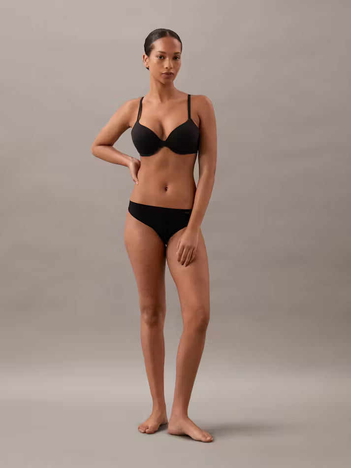 Black underwire lightly lined full coverage bra with thin straps and matching briefs in soft fabric for everyday comfort