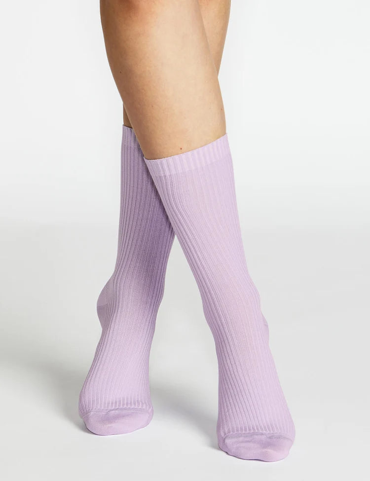 Lilac ribbed knit crew socks made of soft material designed for comfortable everyday wear