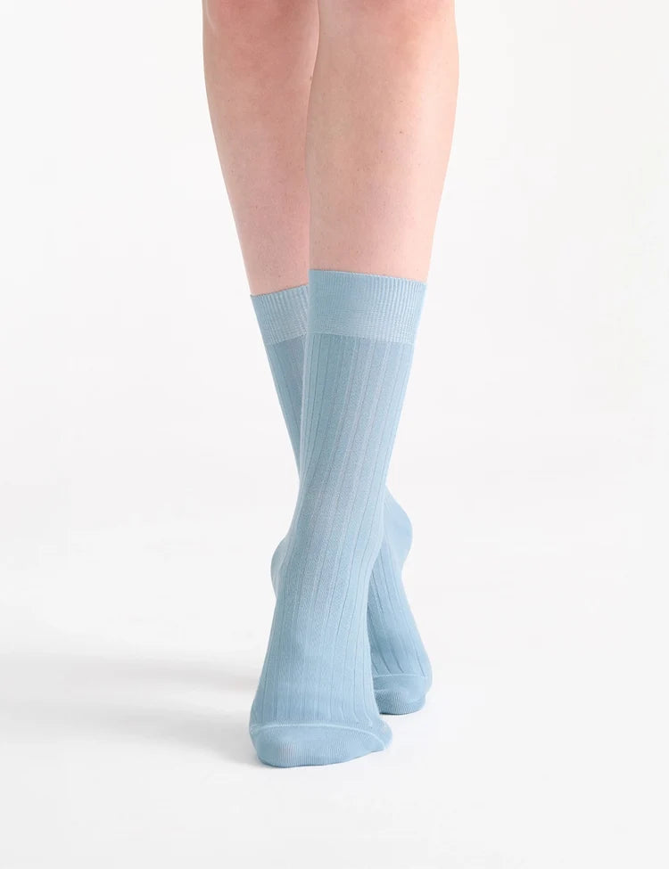 Light blue ida classic rib crew socks made from ribbed knit material for comfortable everyday wear