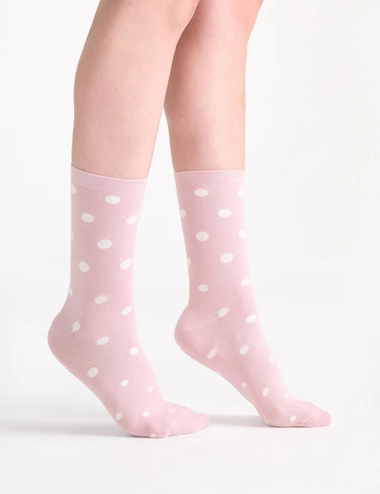 Gigi Spot crew sock featuring pink fabric with white polka dots in a comfortable cotton blend design