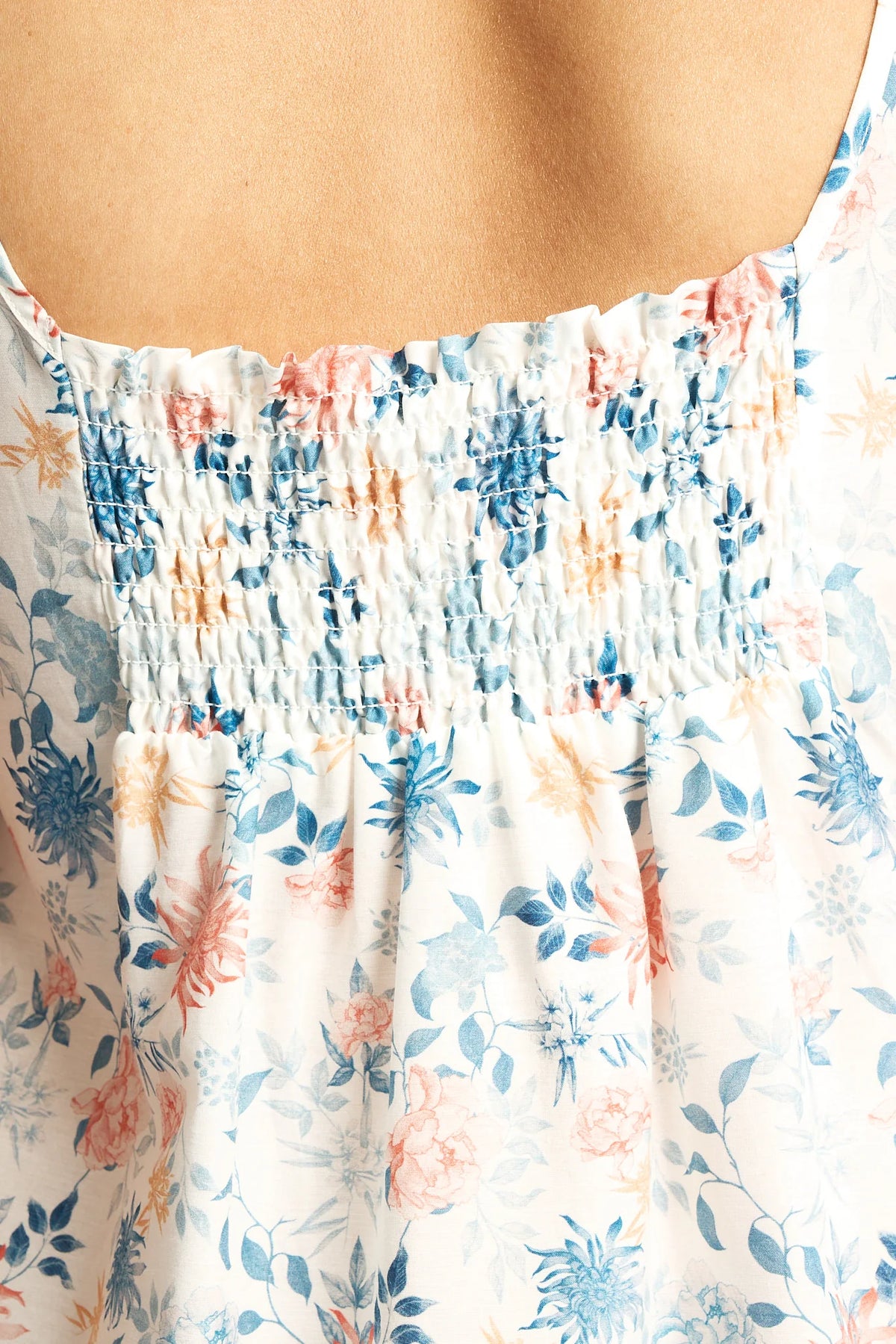 Cotton silk nightie with delicate floral print on white base featuring soft blue peach blossoms and green leaves
