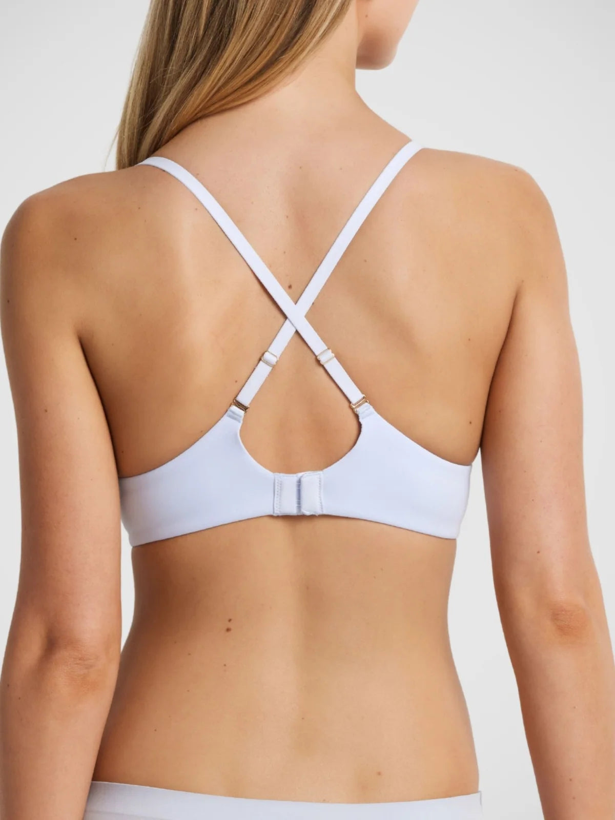 White memory push up bra back view with cross-back design adjustable straps and central clasp closure