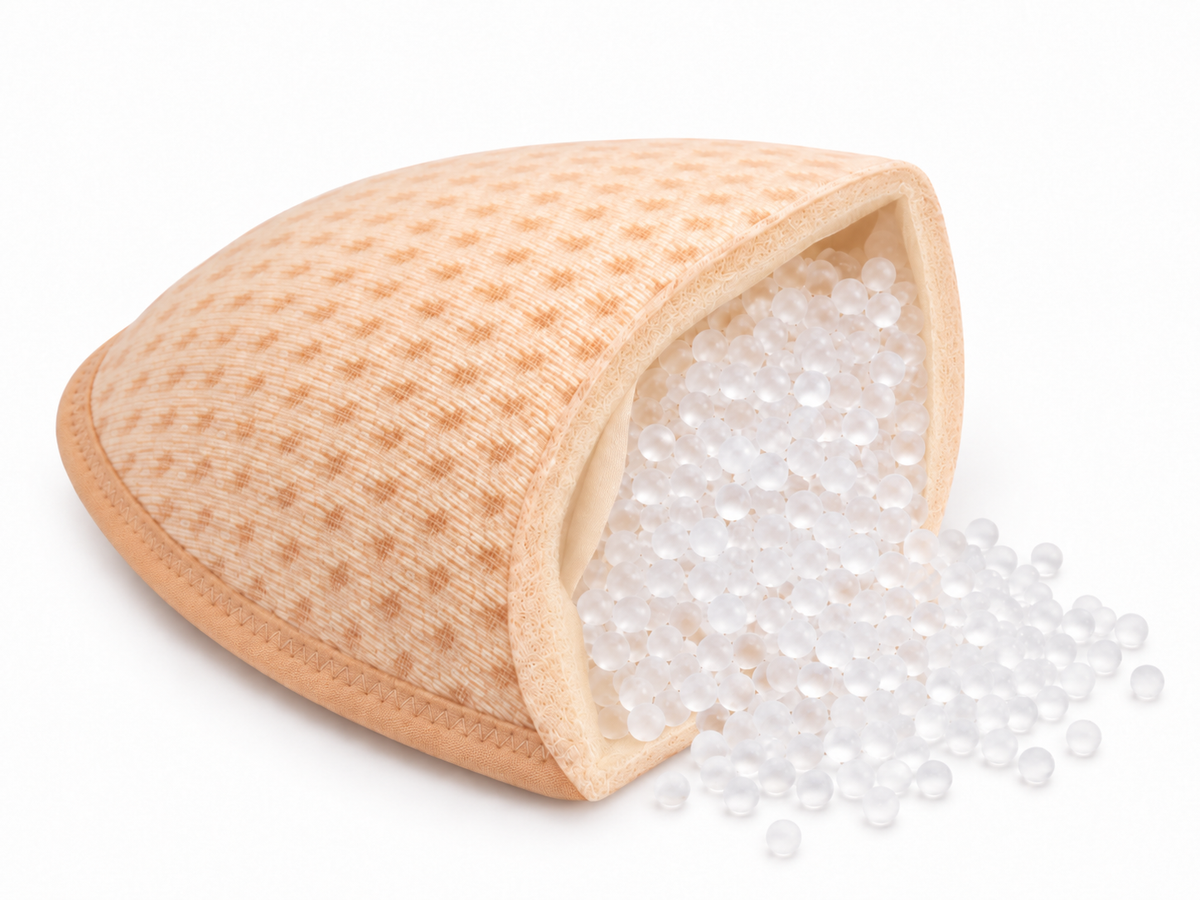 Beige woven fabric shoe insole with a dotted pattern designed for sleep breast forms pair comfort and support