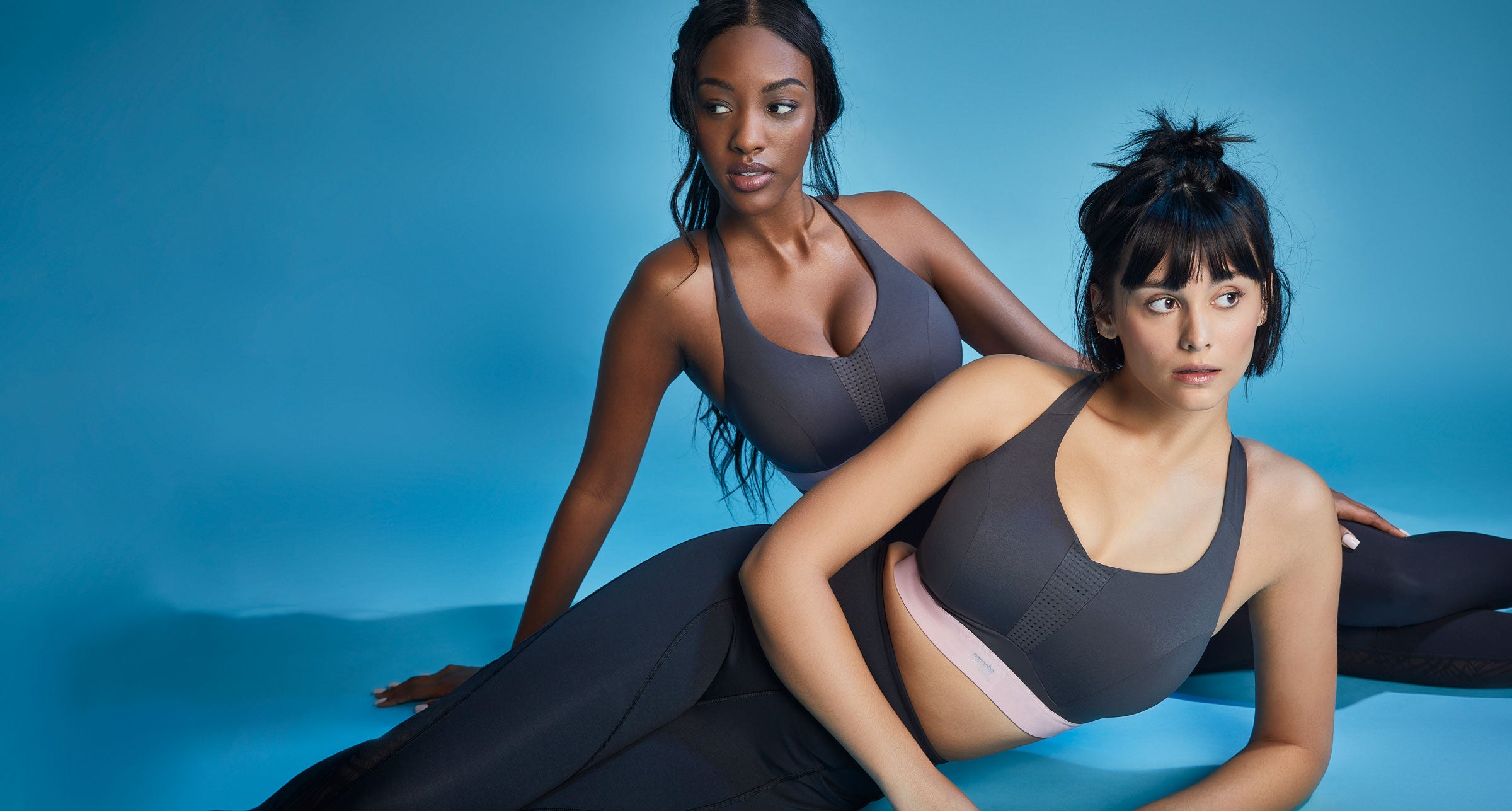 sports bra fittings with two women