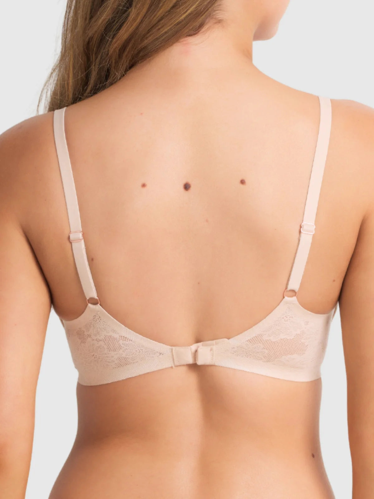 Beige lace underwire plunge bra with thin straps and back clasp