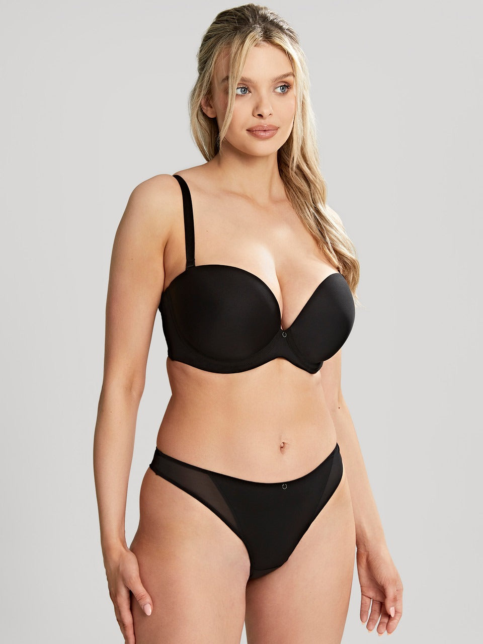 Black faith moulded strapless bra with underwire and thin straps paired with matching sheer mesh briefs