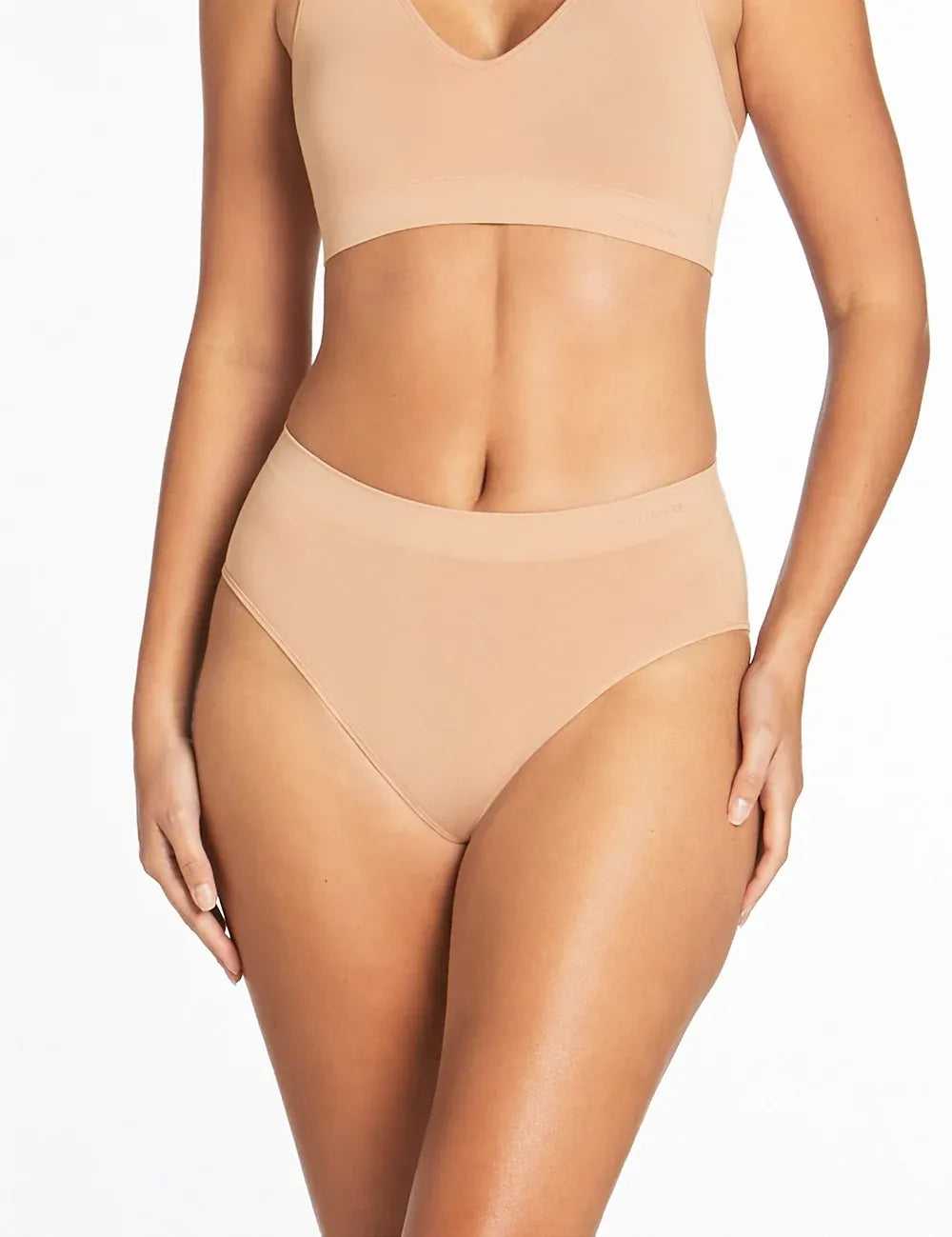 Beige high waisted seamless midi briefs in smooth stretchy fabric with a flattering v neckline top purebasics 2 pack
