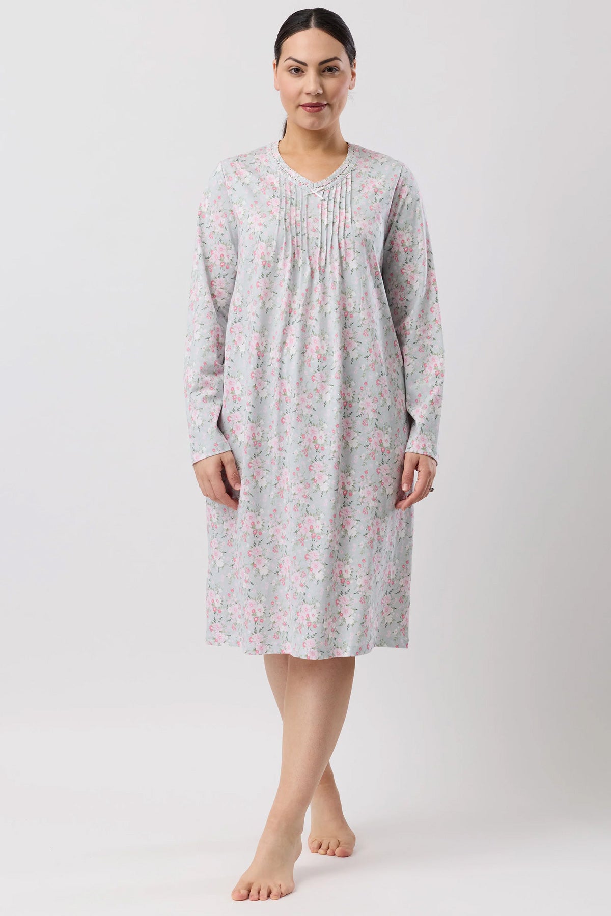 A soft gray bouquet crochet nightie with a delicate pink floral pattern long sleeves and pleated neckline
