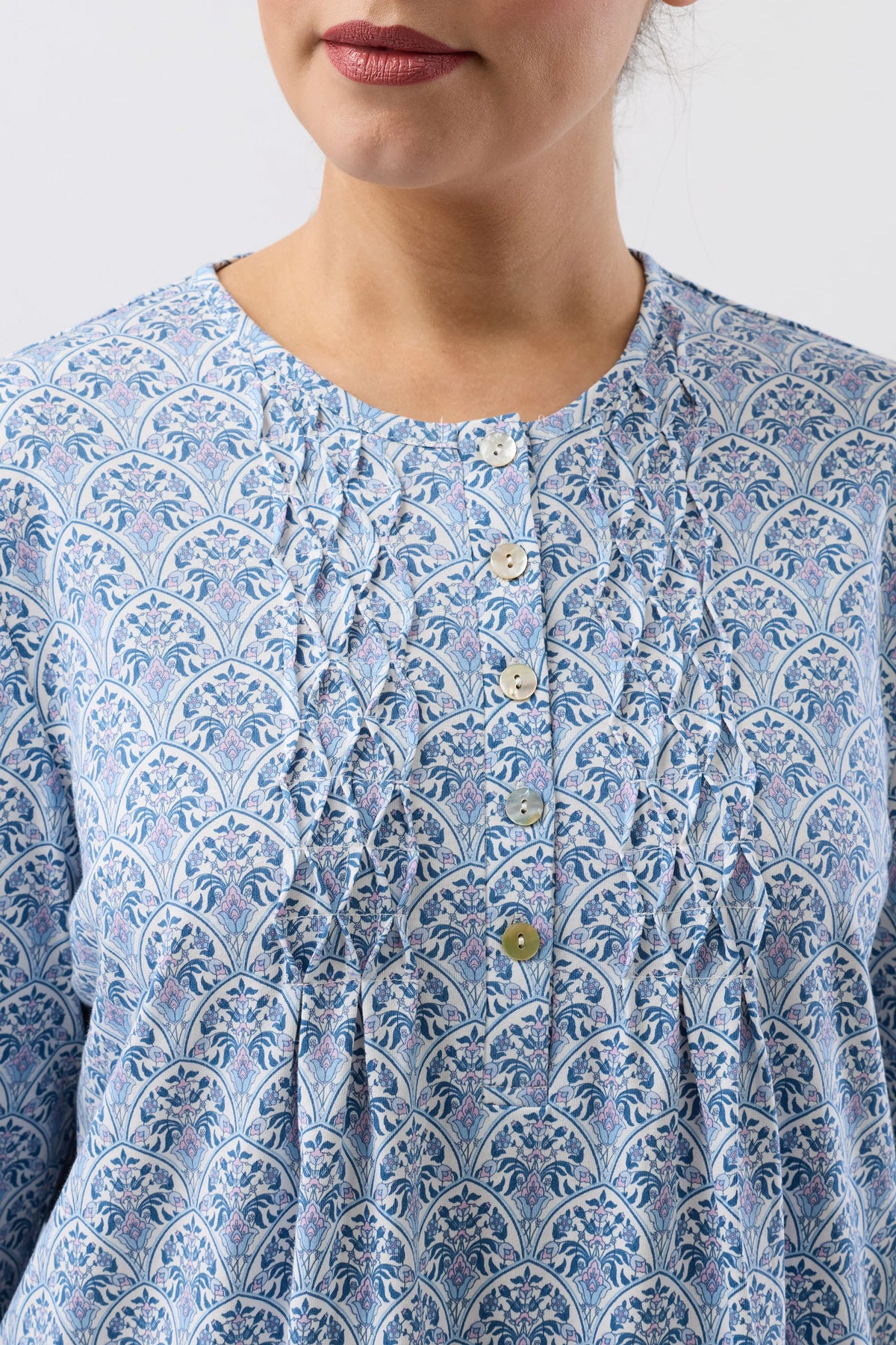 Oriental smock nightie in blue and lavender floral pattern with gathered neckline and button closures