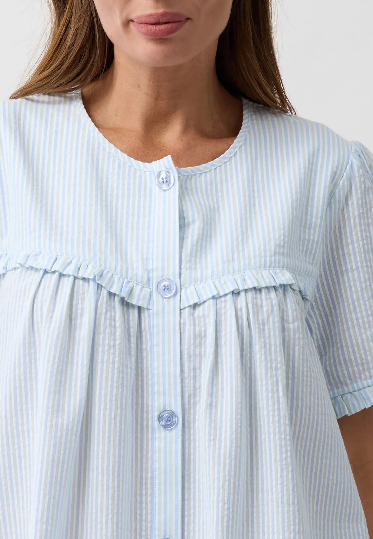 Light blue and white vertically striped cotton stripe brunch coat nightgown with round neckline and ruffled trim