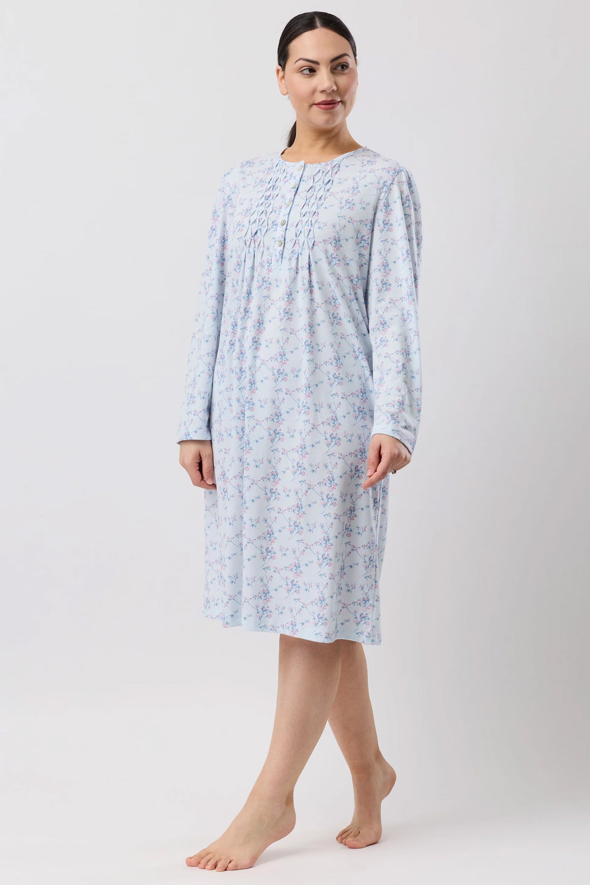 A light blue cherry blossom nightie with subtle floral pattern and delicate embroidery at the neckline
