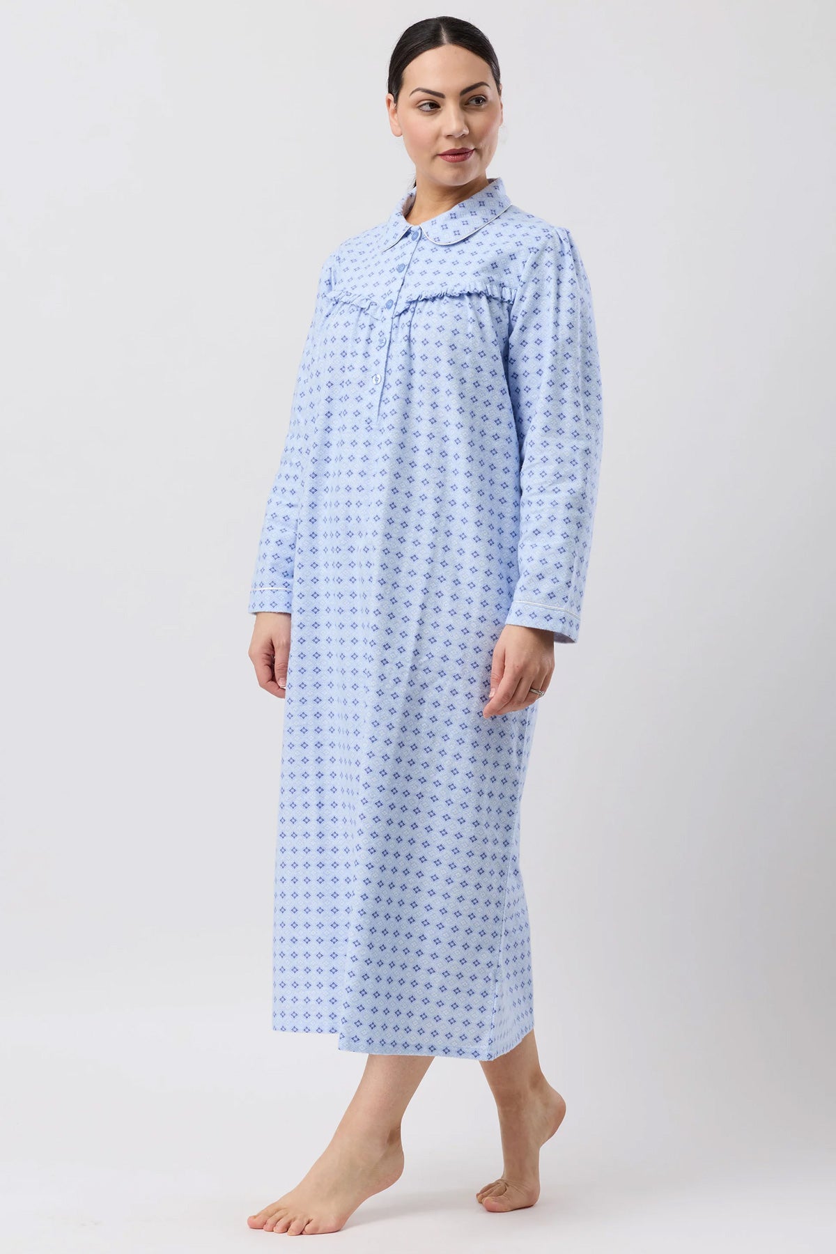 A light blue fleur de lys collar nightie featuring a subtle geometric pattern long-sleeved and classic collar