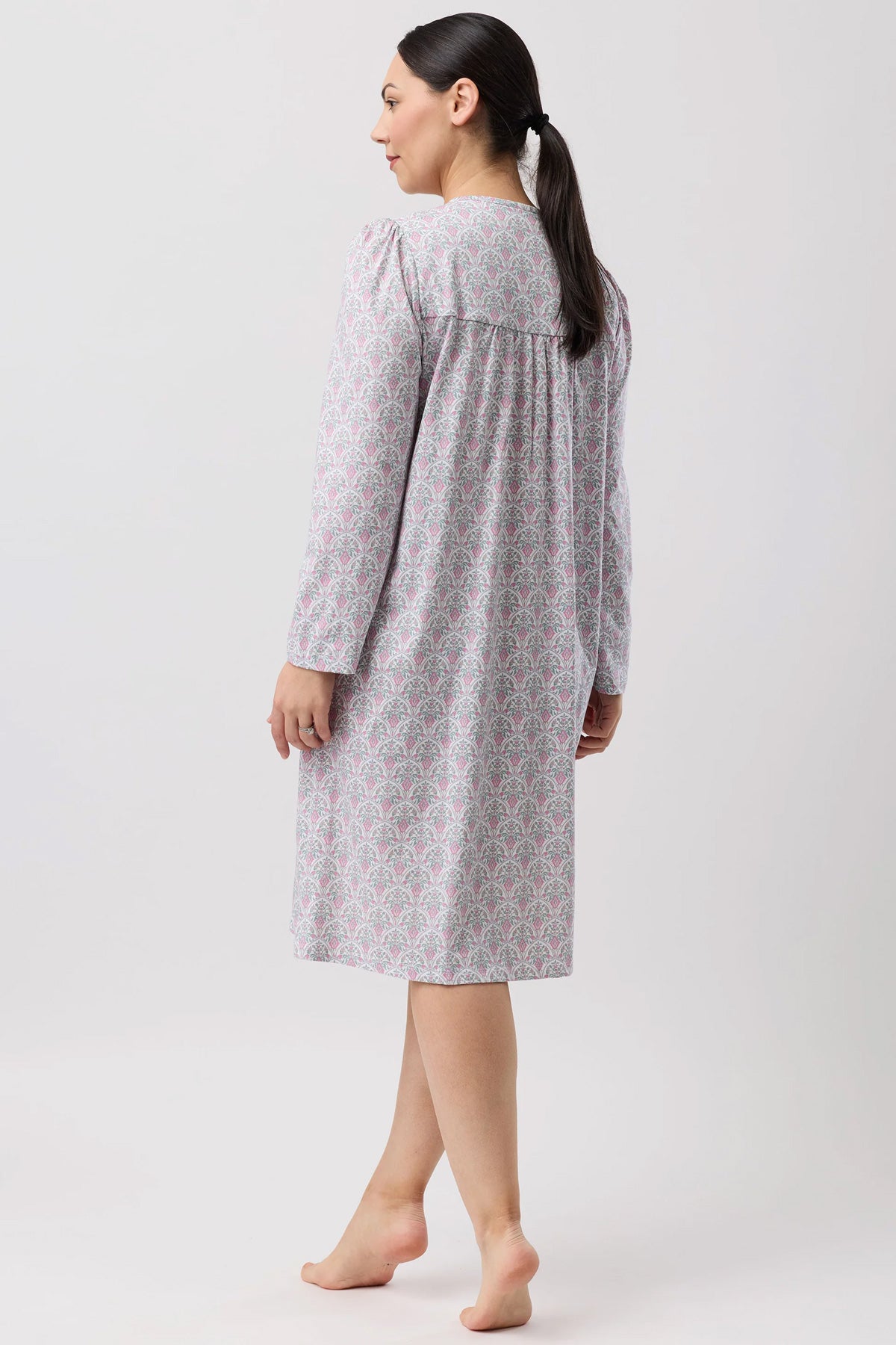 A soft muted gray oriental smock nightie with delicate white floral patterns and long sleeves for comfortable sleep