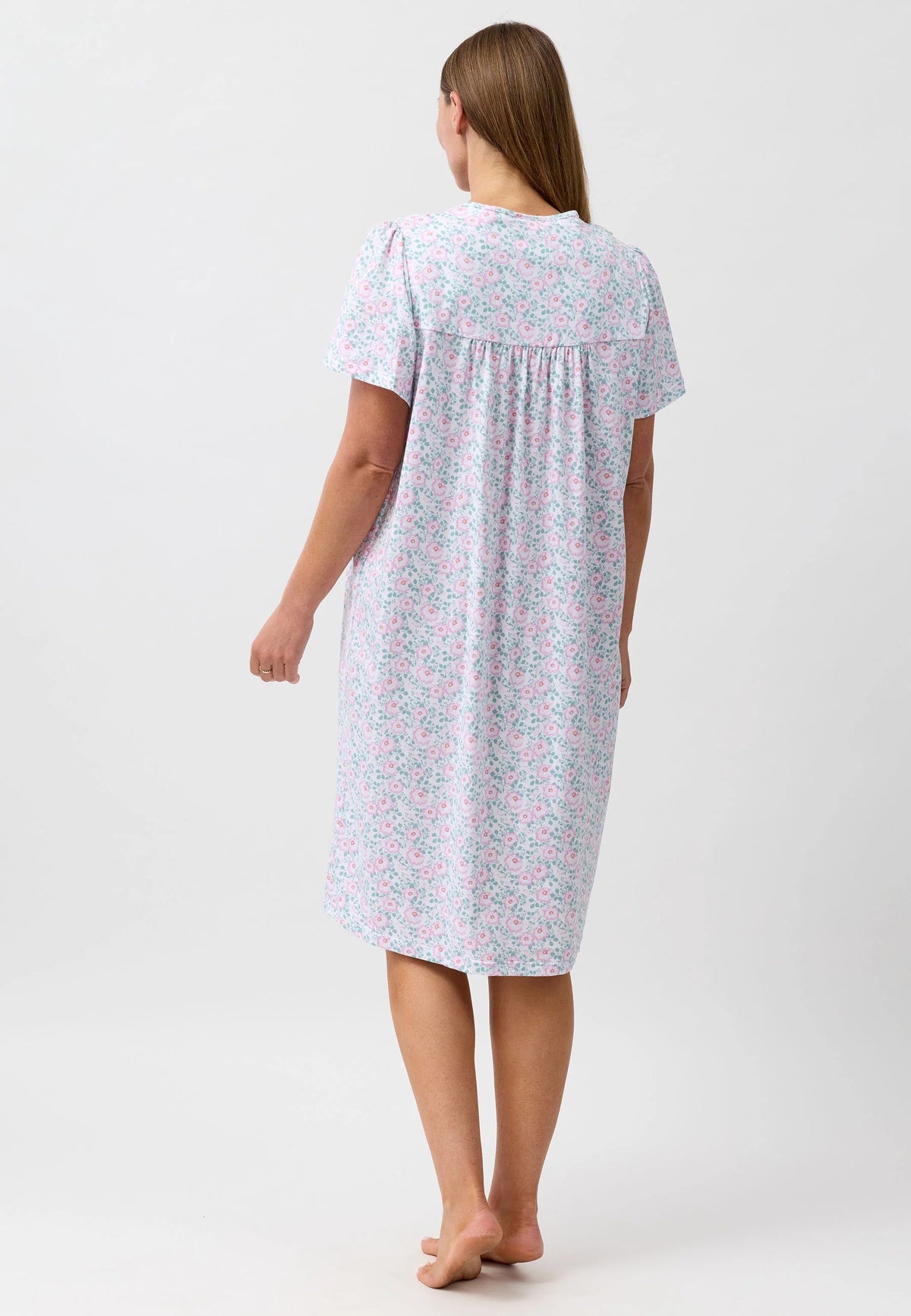 Camellia short sleeve nightie is a soft light lavender nightgown with delicate pink and blue floral patterns