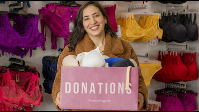 Woman holding box of donations