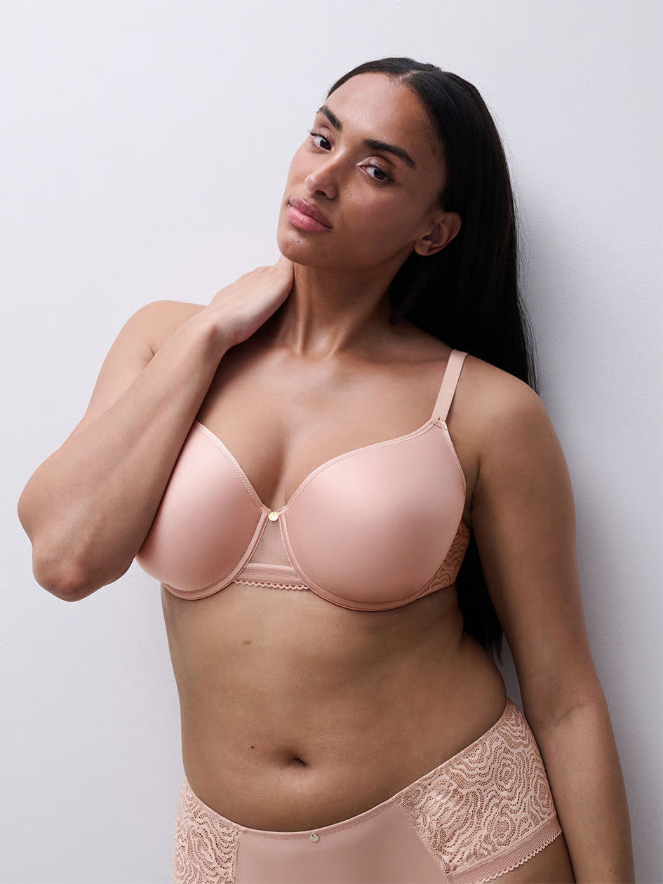 A soft blush pink c jolie comfort convertible t shirt bra with underwire lace trim and subtle metallic accent