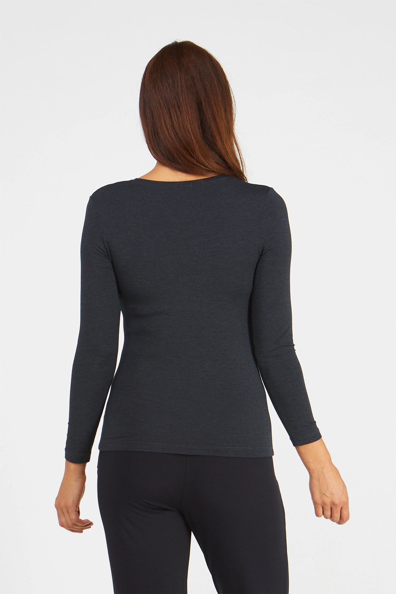 Woman wearing Tani 79276 High Neck Long Sleeve in graphite back view