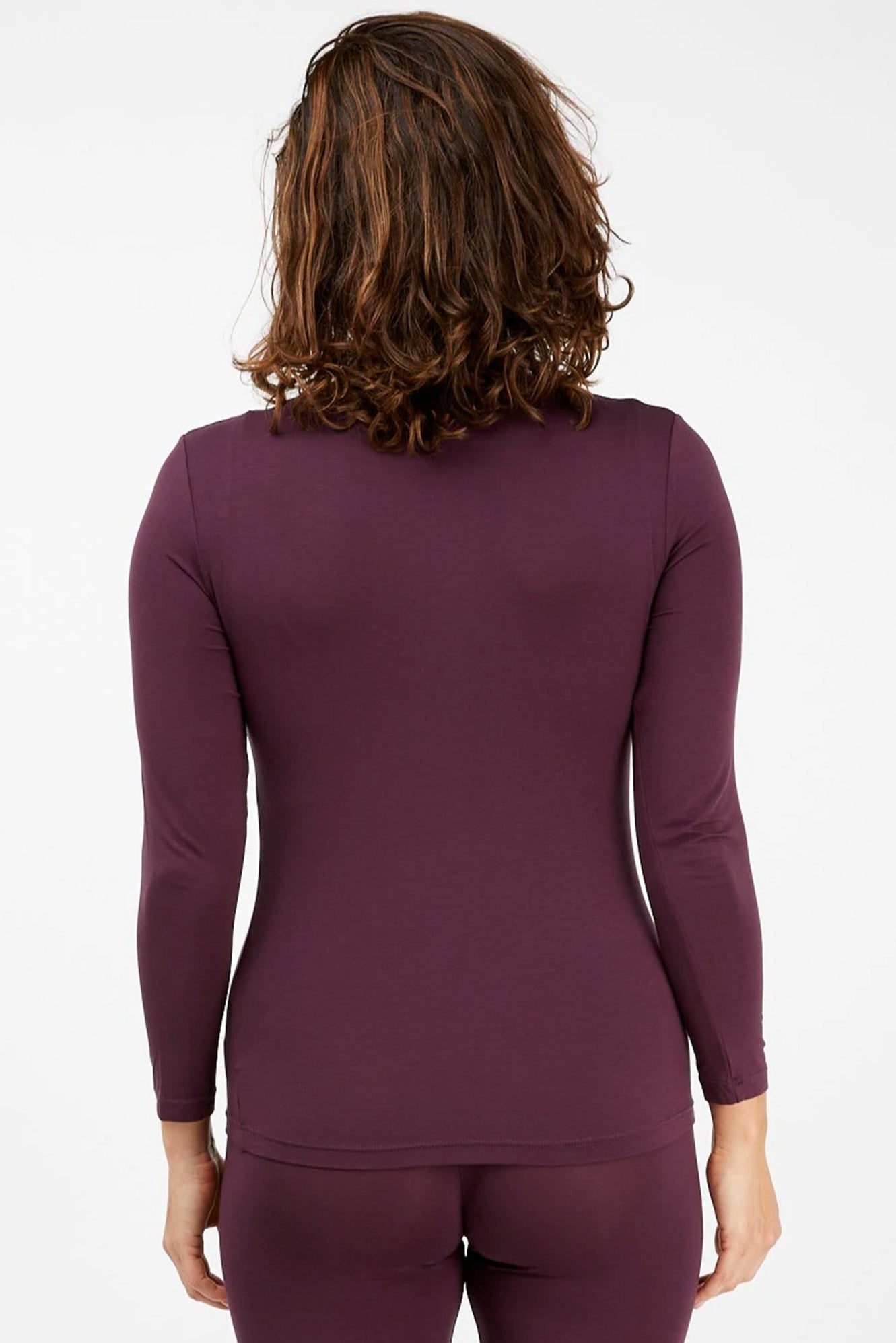 Young woman wearing Tani 79276 High Neck Long Sleeve in Wine Tasting back view
