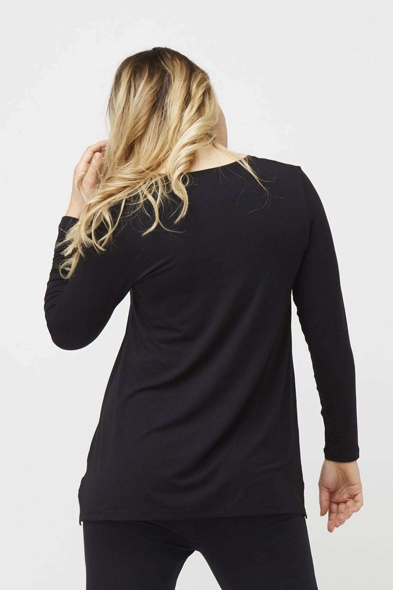 Woman wearing Tani Swing Long Sleeve in black 79372 back view