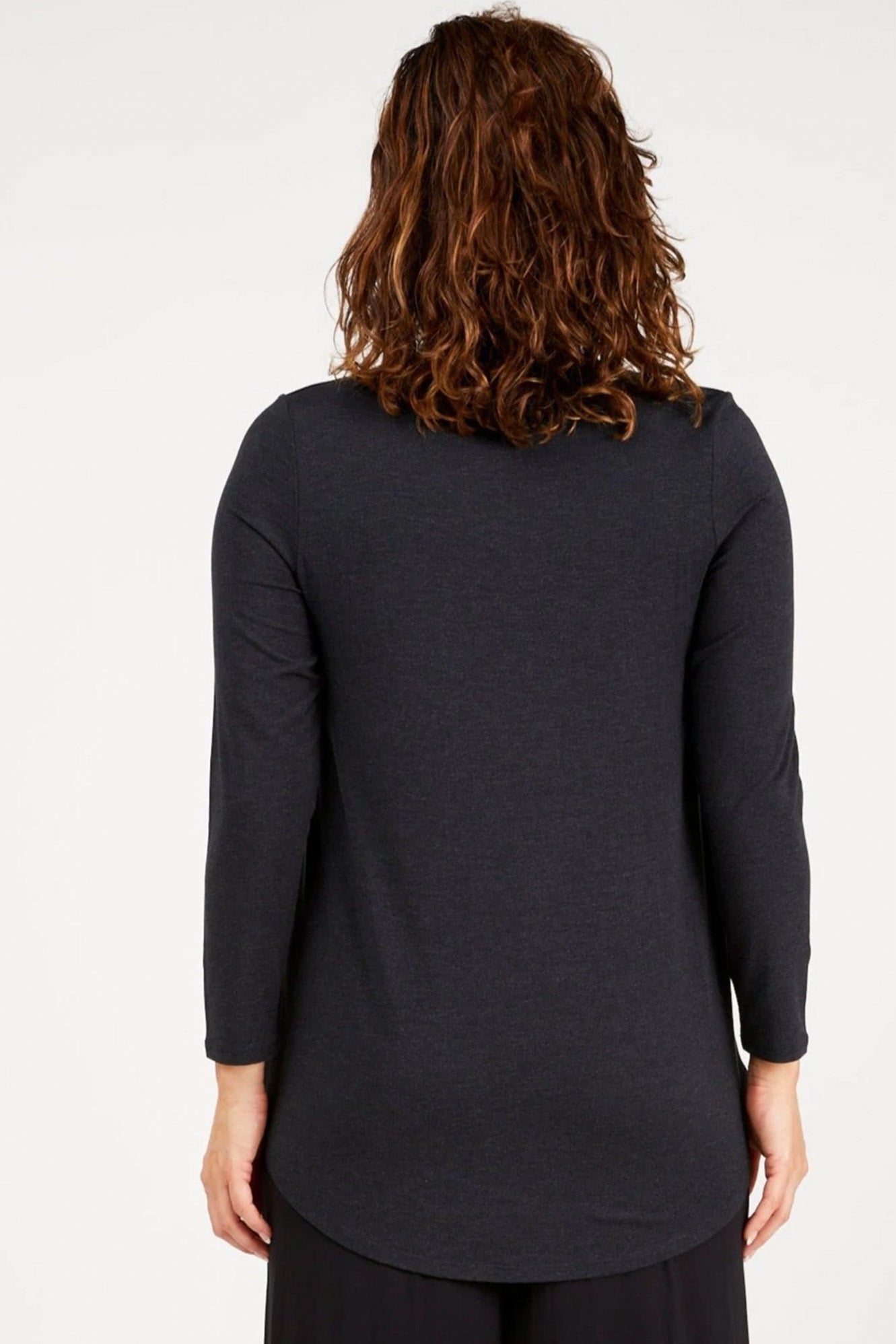 Young woman wearing Tani 79767 Cara Long Sleeve in Graphite back view
